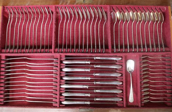 A canteen of early 20th century Portuguese 833 standard silver cutlery for twelve, weighable silver 143.4oz.